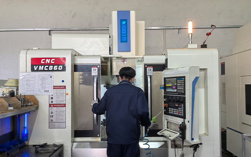 Welso staff are adjusting processing equipment at the centrifuge factory
